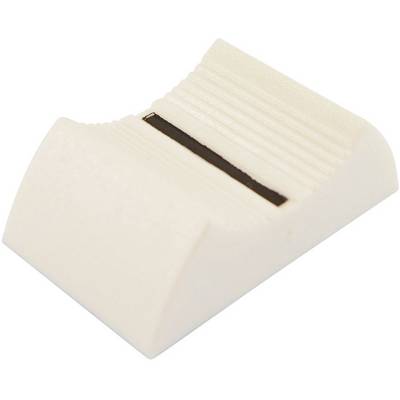 A white rubber accent, roughly rectangular, with a black insert in the centre. Presumably part of a mechanical product.