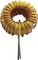 Copper coil with a yellow core, wire closely wound. Electronic component for inductance generation.