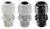 Three cable glands in different colours (white, grey, black), standing side by side. They have ridged surfaces.
