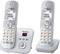 Two cordless telephones with base station, displaying phone number and call list on screens. White, modern design.