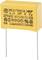 Yellow MKP capacitor with inscription '1.0 µF K X2 275VAC'. Displays symbols for safety and certification standards.