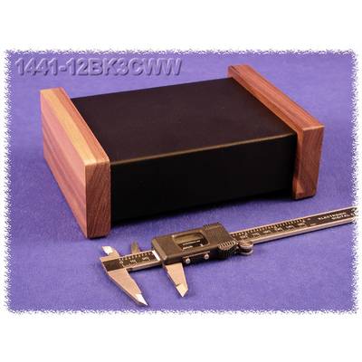 A black box with wooden walls sits on a blue background. A calliper lies beside it.