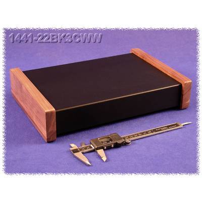 A metal digital vernier calliper with a digital display is placed in front of a rectangular, black, wooden box on a blue background.
