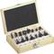 Wooden box with an open lid, containing 15 black router bits of various shapes. Suitable for woodworking.