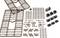Plastic components of a model kit on a white background, sorted in different shapes and sizes, ready for assembly.
