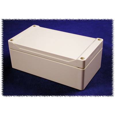 A rectangular, white plastic enclosure with rounded corners and screw holes on a blue surface.