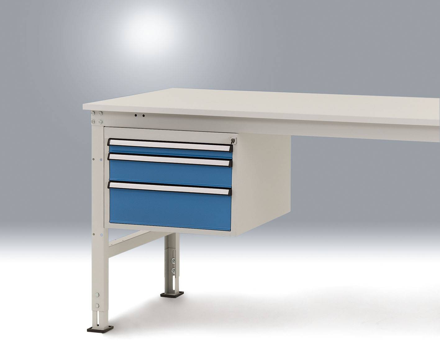 White desk with two blue drawers on the left side, against a grey background.