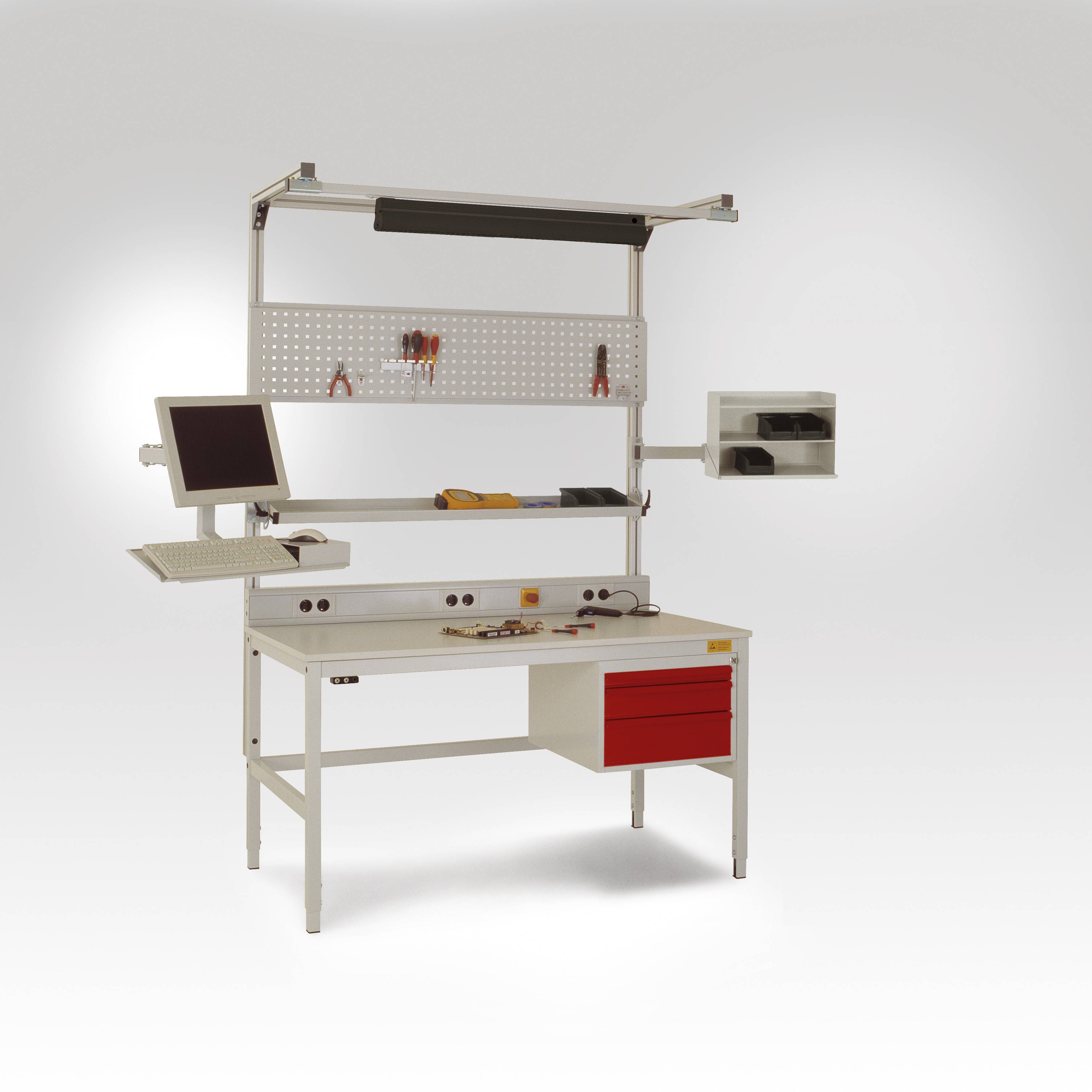 Modern workbench with monitor, keyboard, pegboard for tools, drawers and shelves. Ideal for technically-oriented work environments.