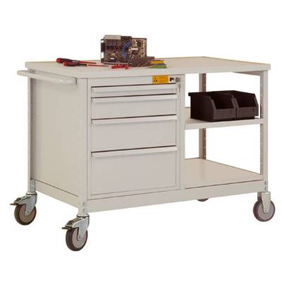Workbench with drawers and side shelving on castors, equipped with tools and an electrical control panel placed on top.