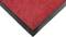 Red carpet surface with black border, corner viewed from above.