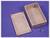 A rectangular metal enclosure with its cover removed, with four screws beside it on a lilac background.