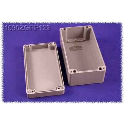 Grey plastic casing, two parts: lid and base, on a purple background. Rectangular shape with screw openings.