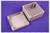 '1590ZGRP161' grey plastic junction box, rectangular, open cover beside it, on a purple background.