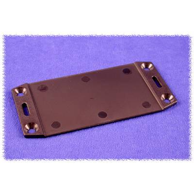 A rectangular metal plate with holes at the corners rests on a blue background.