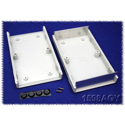 Opened grey electronic enclosures with screws and rubber feet, lying on a blue background.