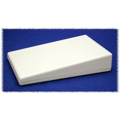 A rectangular, white plastic casing with an angled surface rests on a blue background.