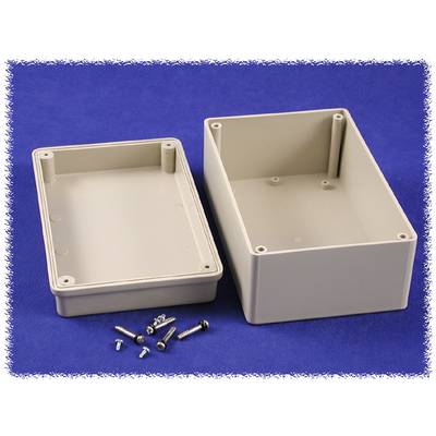 Plastic casing with removed lid and accompanying screws placed beside it on a blue background.