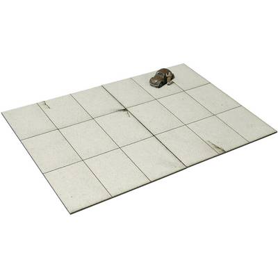 An old toy car sits on a large square floor with a beige and brown checked pattern that appears slightly worn.
