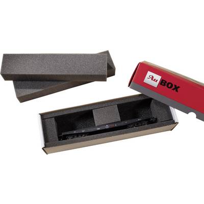Packaged model railway accessory in foam lining, surrounded by an opened red cardboard box with the inscription 'BOX'.