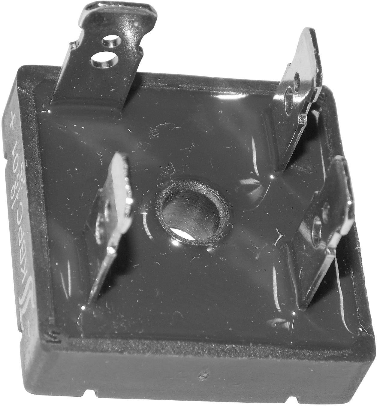 A rectangular rectifier with four metal terminals, used for converting alternating current to direct current.