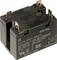 Electrical relay cube with multiple metal terminals, labelled with voltage specifications and manufacturing information.