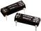 'Two black Crydom semiconductor relays, models DPA6111 and SDV2415, each with input and output terminals.'