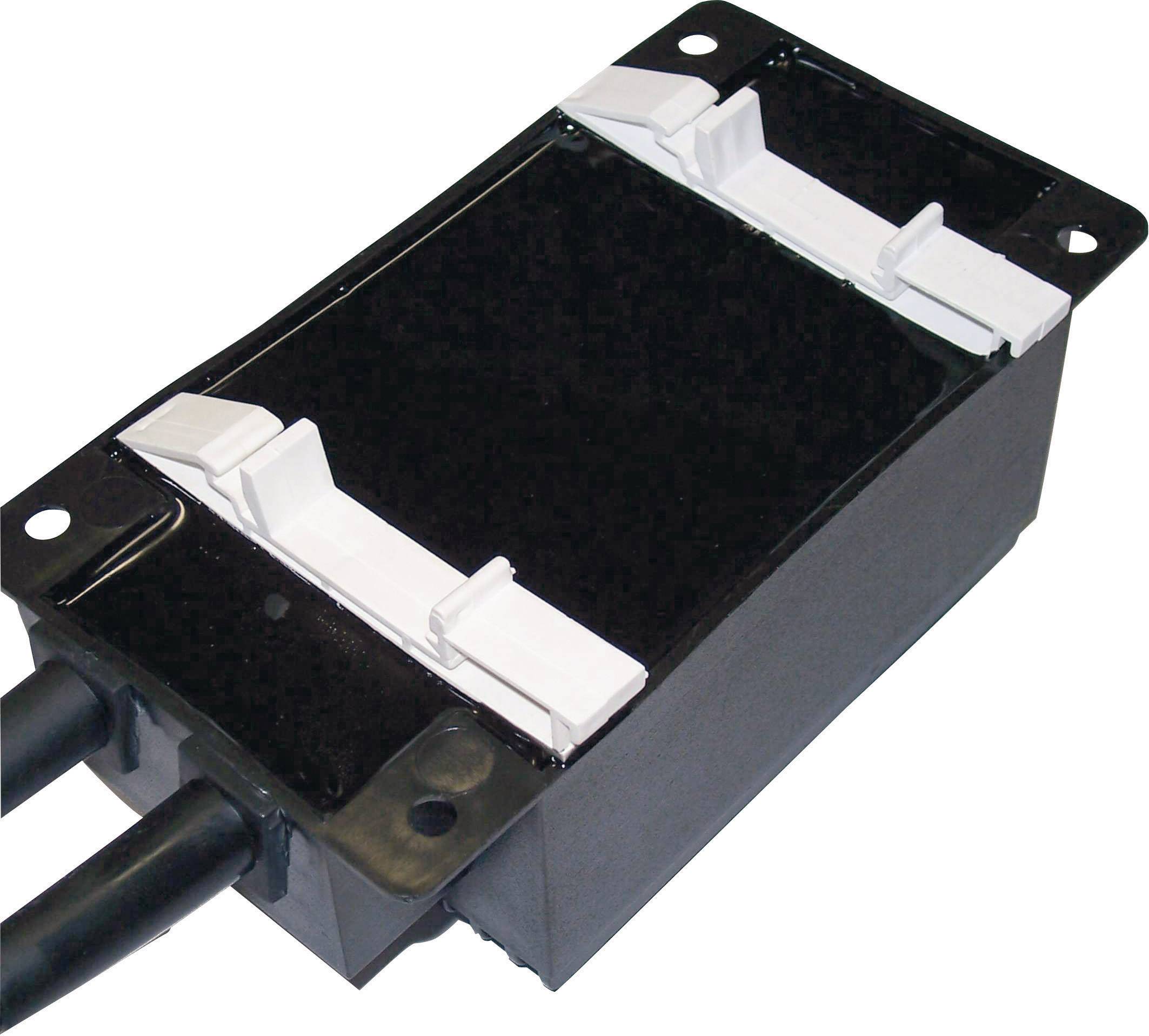 A rectangular electrical component with two cables and white connectors on the top surface, possibly a transformer.