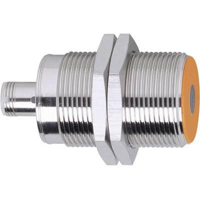 A cylindrical, metallic sensor with an orange head, installed in machines or devices for non-contact detection.