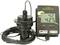 A level meter LC 100 with a digital display shows measurement values '42' and '425'. A cable connects the sensor to the display unit.