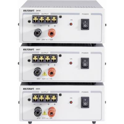 'Three stacked Voltcraft power supplies, models 2410, 3607 and 4805, with different output voltages and current ratings. Each device has switches and connections.'