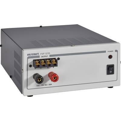 Grey power supply unit with Voltcraft logo. It shows connections for 11V-15V DC, 35A and a power switch. Suitable for electrical devices.