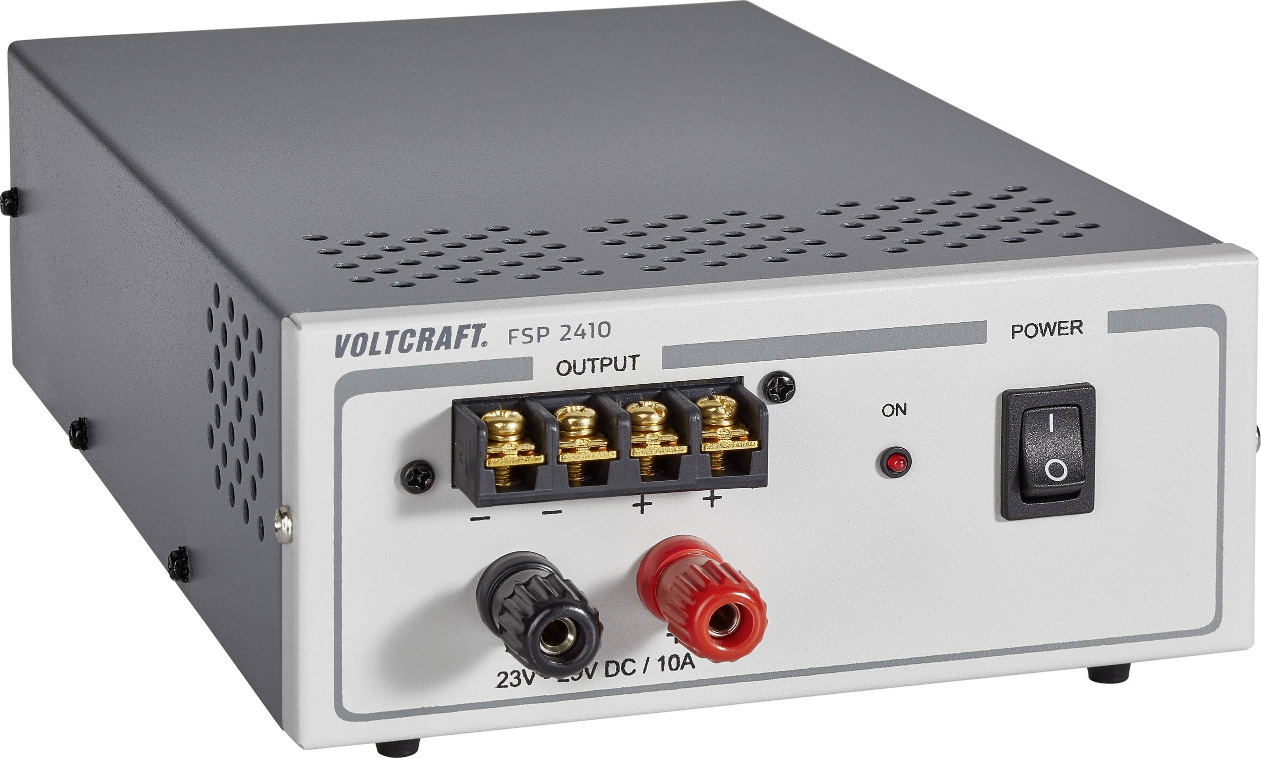 Power supply unit with switches and terminals, model 'VOLTCRAFT FSP 2410', delivers 23-30V DC at 10A.