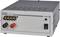 A grey power supply unit with the label 'Voltcraft FSP 2420'. It displays inputs and outputs with a switch panel and a power indicator.