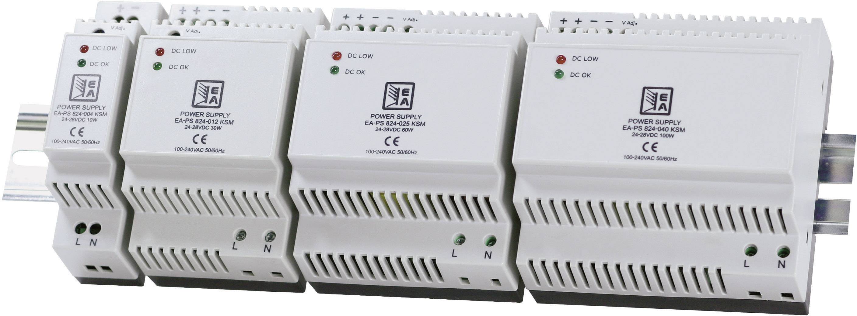 Several white power supply modules are mounted on a DIN rail. Each module displays green and red LED indicators and CE markings.
