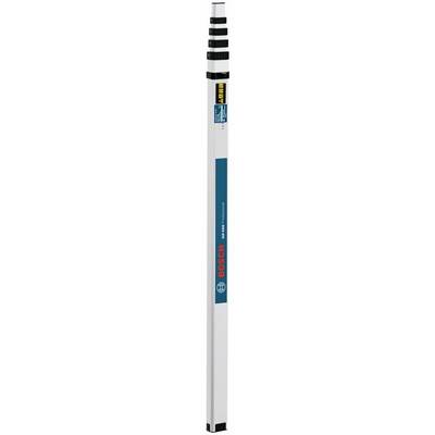 A white measuring rod with black markings and a blue label with red writing.