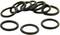 A collection of ten black O-rings, arranged in a loose circle.