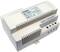 A white electronic transformer for low-voltage halogen systems, with input and output details printed on the label.