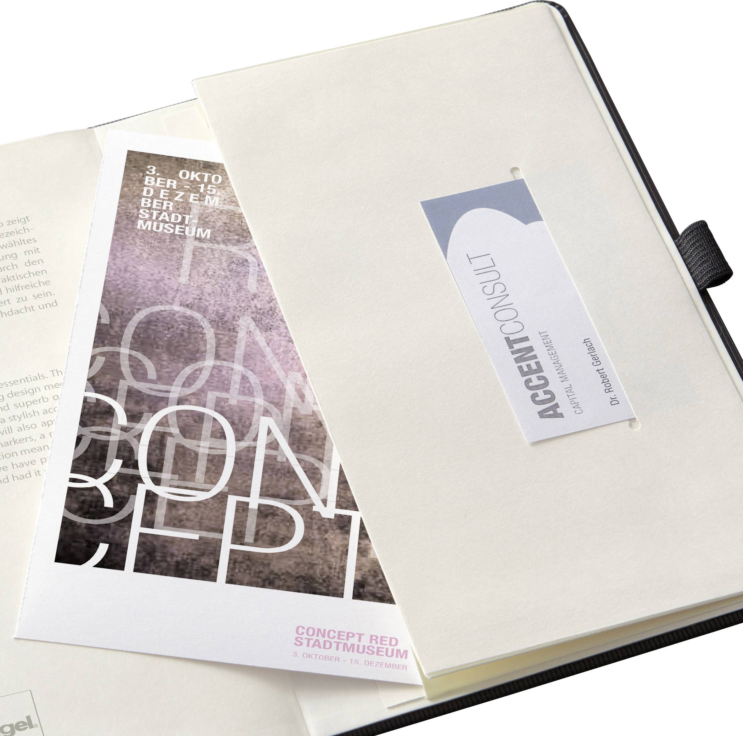 A notebook with two slip pockets. An advertisement for 'Concept Red' in the city museum and a business card from 'Accent Consult'.