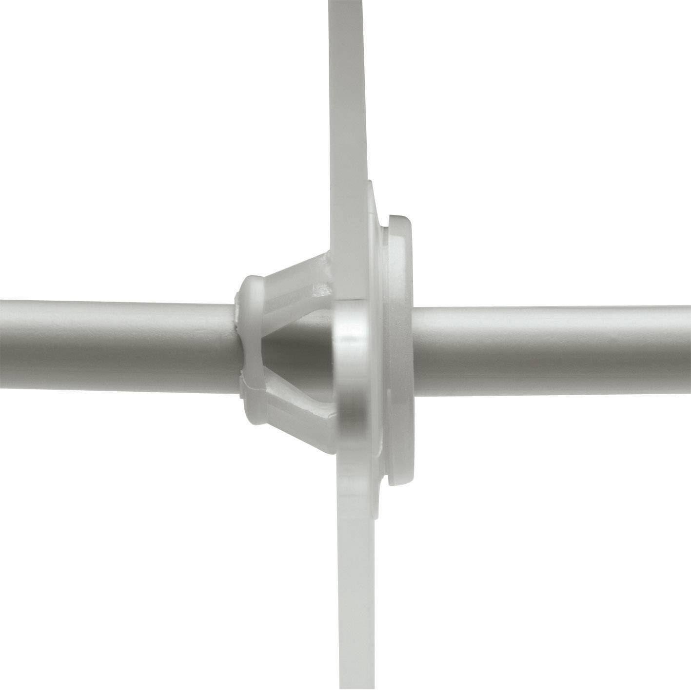 A silver metal tube pierces through a white disc in the centre.