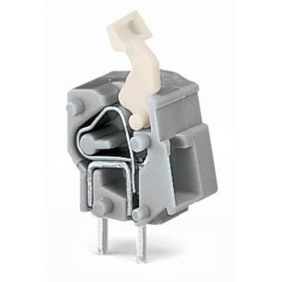 Grey plastic component with metal contacts and a beige-coloured lever.