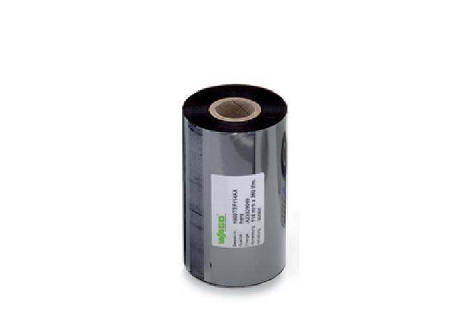 A roll of silver label material with a white label attached.