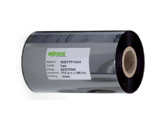 A rollable label material from WAGO with the details: Order number 100DTTF14AX, resin material, Batch A23329049, Dimension 114 mm x 360 ft, inner winding.
