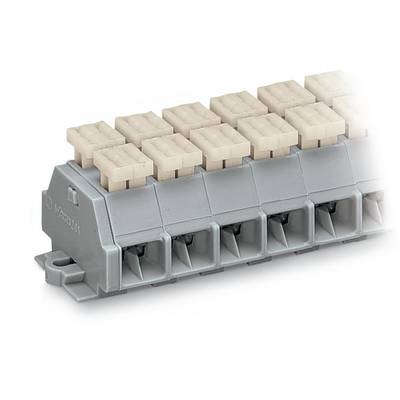 A grey electrical terminal block with multiple ports, fitted with beige covers, for connecting cables.