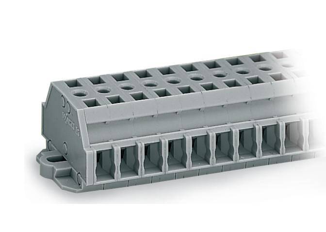 Grey electrical connector block, rectangular in shape, with multiple cable connections, used for electrical connections.