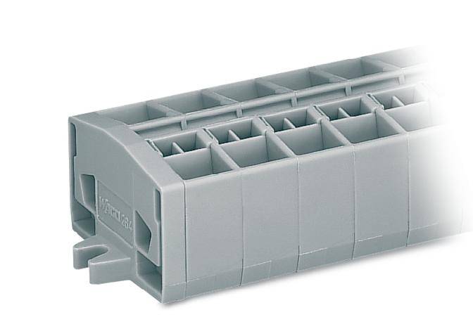 Grey plastic component with multiple rectangular compartments. Designed for industrial applications, demonstrates functional design without embellishments.
