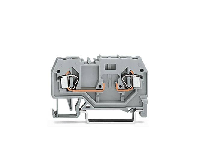 Grey-orange electrical wiring terminal block, showing connection points and metal conductors; industrial component view.