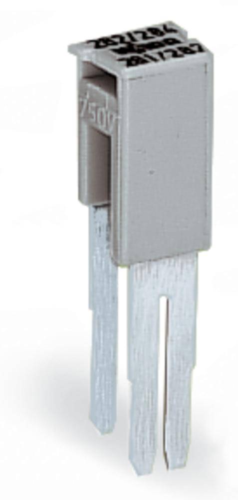 A rectangular, grey ceramic capacitor with two flat metal terminals, standing on a white surface.