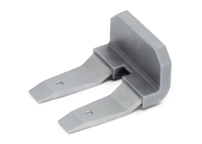 A silver-coloured, two-pronged metal tool with a grey plastic handle, used for lifting or securing objects.