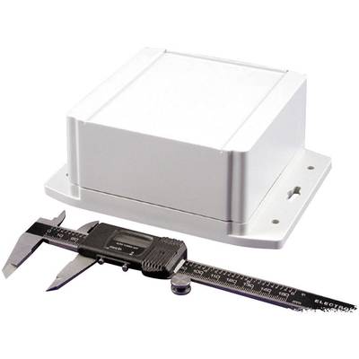 A white box on a stand next to a black vernier calliper.