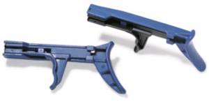 Two blue surgical stapling devices on a white background, one open and one closed, for use in medical procedures.